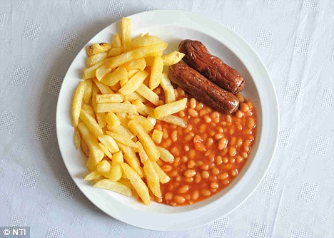 a plate of sausage chips beans served at Three Hills Sports park cafe