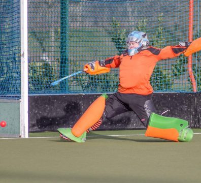 Amy playing in goal hockey